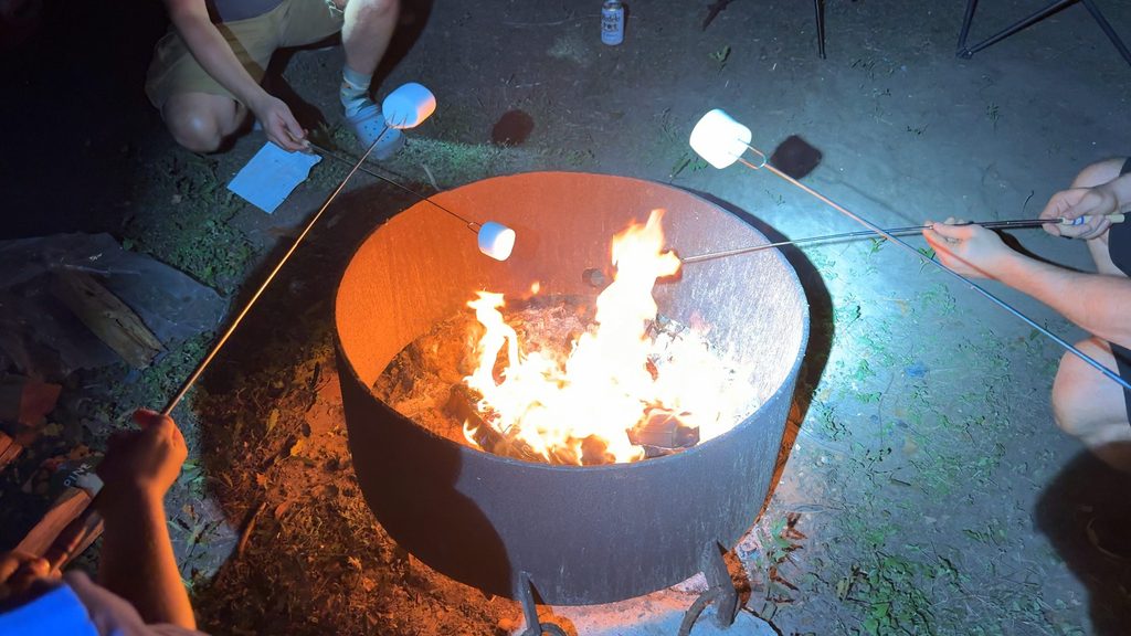 Roasting marshmallows over the fire
